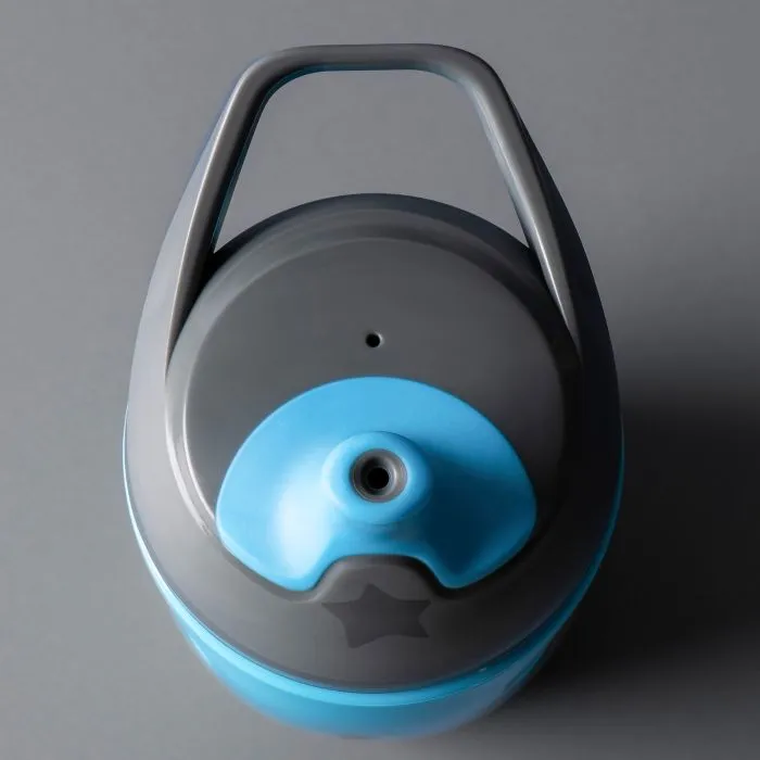 Close up of the insulated sportee bottle against a grey background
