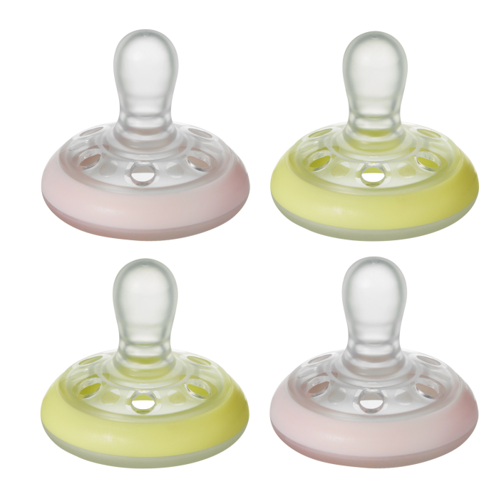 Pacifiers on a white background