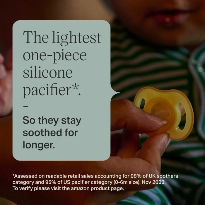 Parent holding a glowing pacifier with text about being the lightest pacifier.