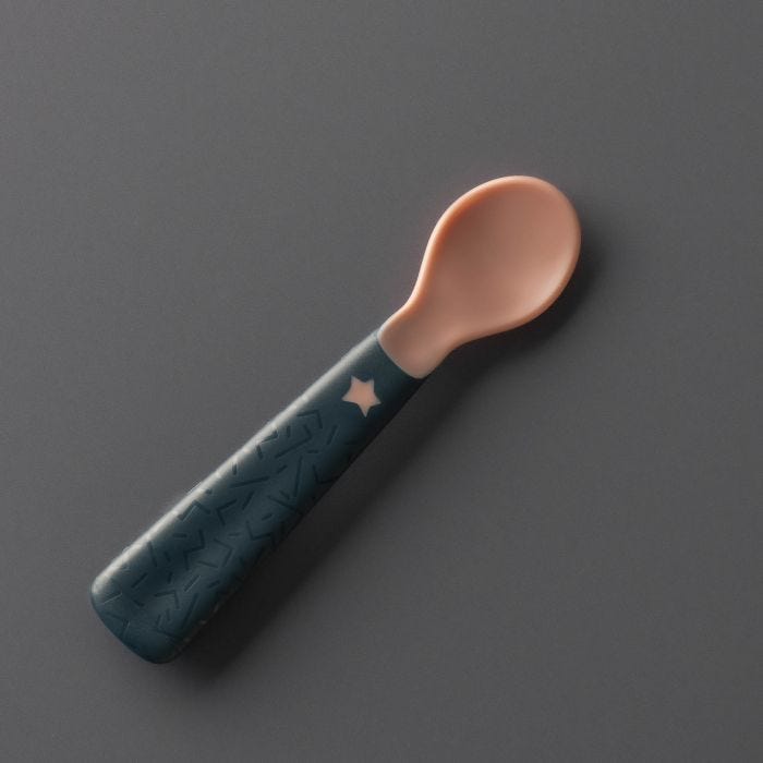 Easigrip feeding spoon on a grey background