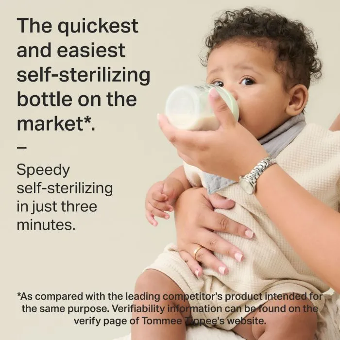 Parent feeding baby with a glass bottle with text about self-sterilization.