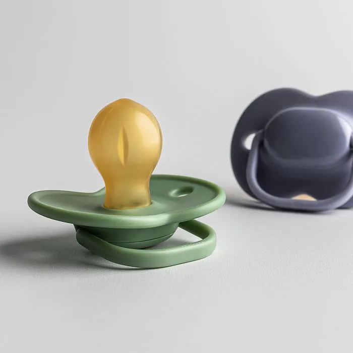 Soothers on a grey background