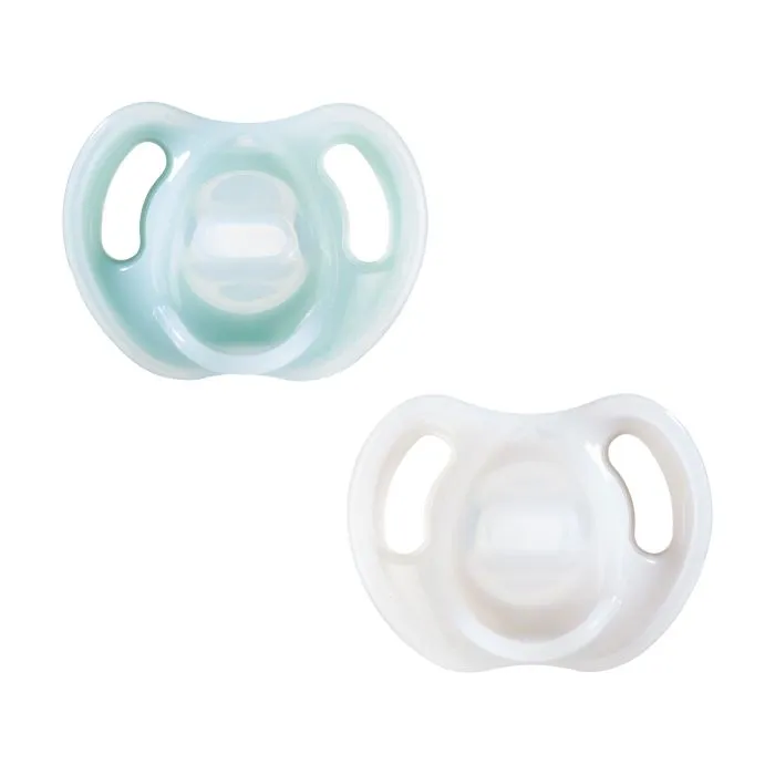 Pacifiers on a white background
