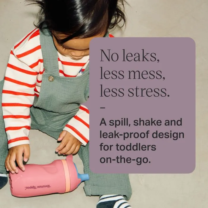Image of a toddler sat on the floor playing with an Insulated Sporty Spout and Straw Cup with text overlay of product feature