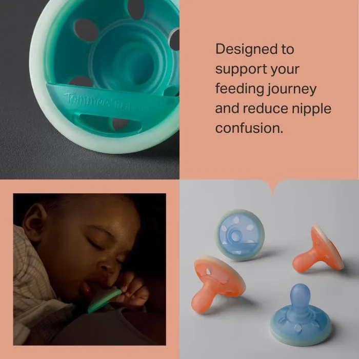 Breast-like pacifiers on gray