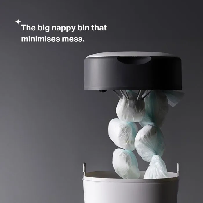 Twist & Click XL nappy bin lid lifted to show wrapped nappies with product USP