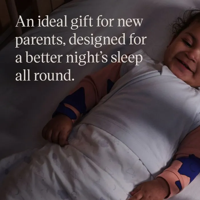 Baby lying in a cot in a sleepbag with text overlay of bundle USP 