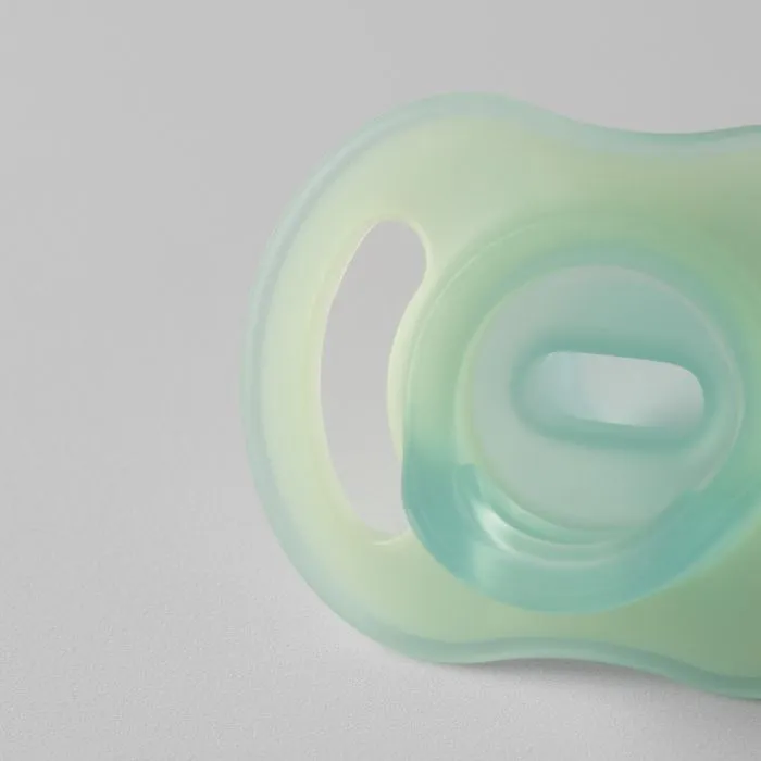 Close up of the back of a night glow soother.