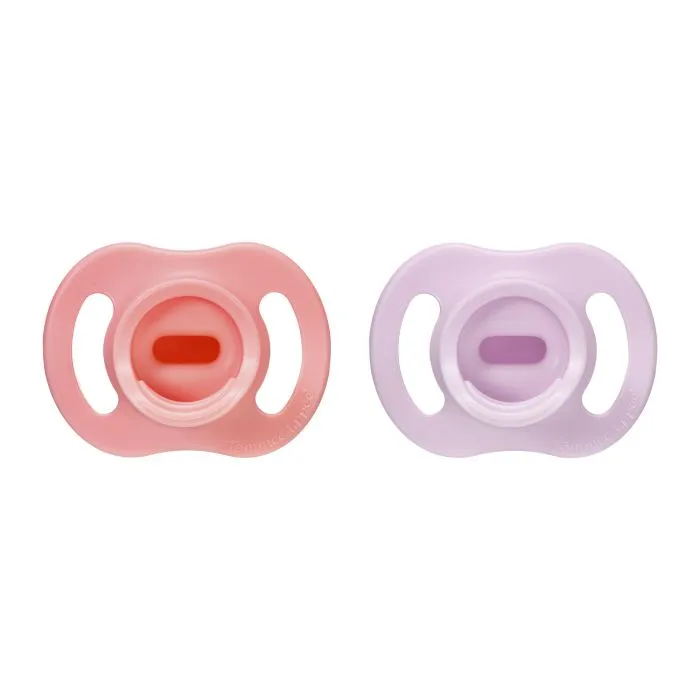 Ultra-light StayPut pacifiers on a white background.