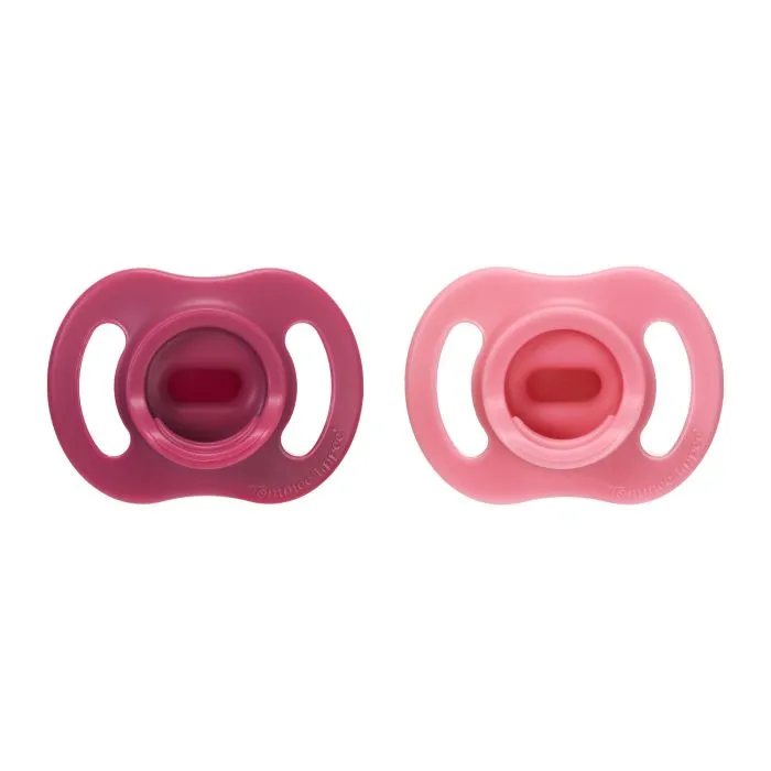 Ultra-light StayPut pacifiers on a white background.