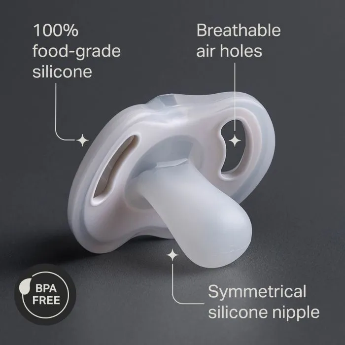 Ultra-light pacifier with key feature pointers listing: food-grade silicone, air holes and a symmetrical nipple.