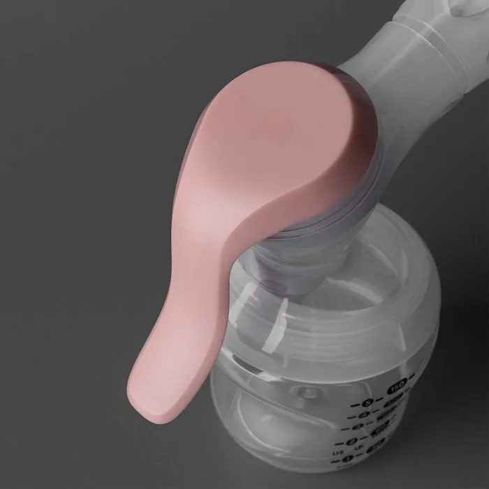 Aerial shot of the manual pump&apos;s narrow neck and ergonomic handle.