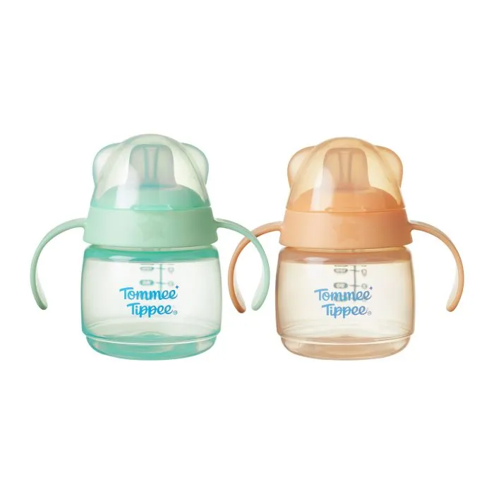 Green and orange transition spout cups against a white background