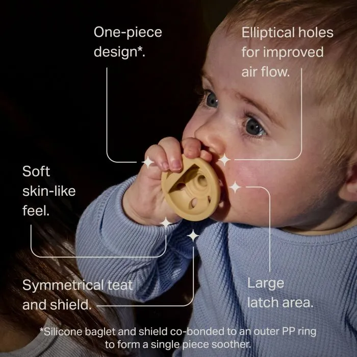 Baby with a yellow breast-like soother and key feature text.