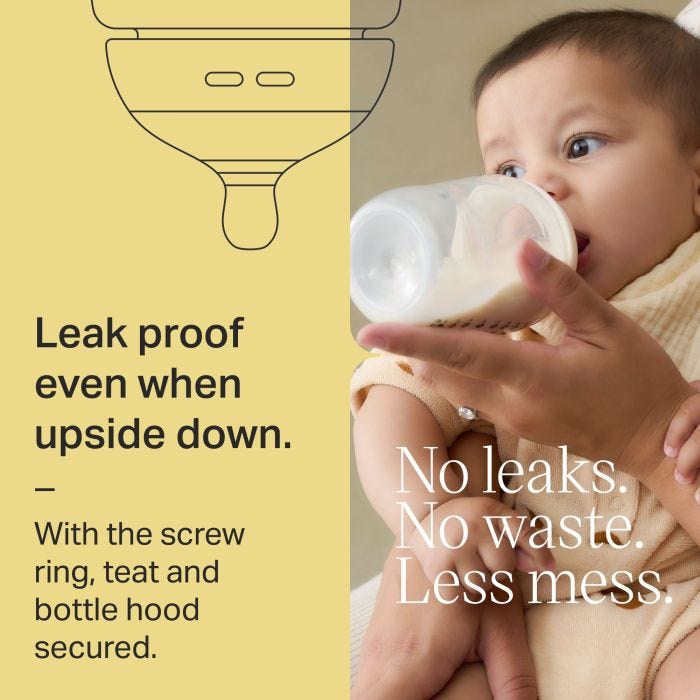 Baby drinking from a Natural Start baby bottle