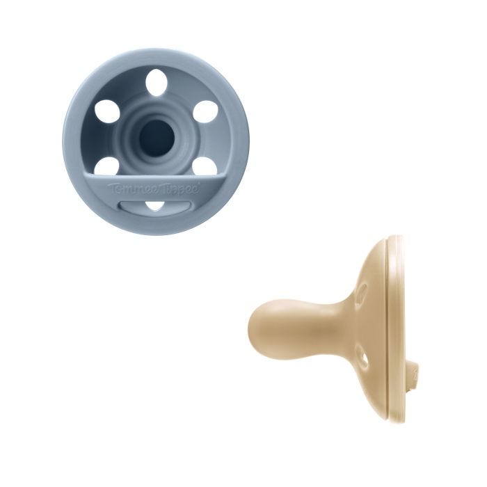 Breast-like soothers on a white background.