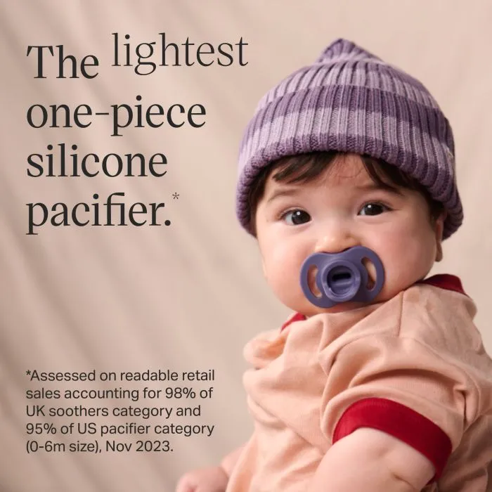 Baby with Ultra-light Stayput pacifier next to feature text.