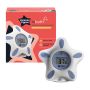 InBath baby bath and room thermometer next to packaging on white background.