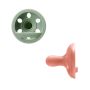 Breast-like soothers on a white background.