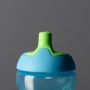 Close up of the Sporty Spout bottle spout against a dark grey background