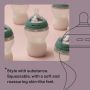 Silicone baby bottles containing milk