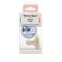 Breast-like soothers in packaging on a white background.