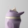 Close up of purple insulated sporty straw cup against a light grey background