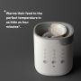 Multiwarm bottle warmer against a grey background with product USP tagline