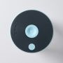 Aerial view of Colicsoothe lid on a grey background