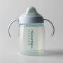 Blue Starter Spout cup against a grey background