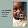 Feature text in front of a baby with a glow in the dark soother.