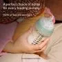 Woman holding a baby and carrying an Advanced Anti-colic bottle with text alongside about how 95% of babies accept these bottles