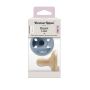 Breast-like soothers in a packaging box on a white background.