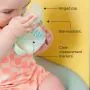 Toddler drinking from a transition spout cup against a yellow background with pointers to the product key features