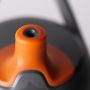 Close up of the insulated sportee bottle against a grey background