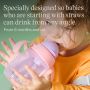 Toddler drinking from a pink trainer straw cup with text overlay of product USP tagline