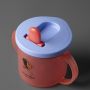 Close up image of First Cup with the spout up against a dark grey background