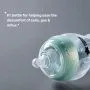 Advanced Anti-Colic baby bottle against a grey background with product USP tagline