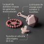 Coffret confort en silicone sur fond anthracite avec des indications sur les principales caractéristiques.