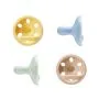 Breast-like soothers on a white background.