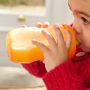Close up of a child drinking from a Sporty Spout bottle