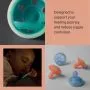 Breast-like pacifiers on gray