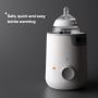 Baby bottle placed inside an Easiwarm bottle warmer against a grey background with product USP tagline