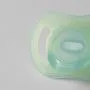 Close up of the back of a night glow soother.