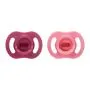 Ultra-light StayPut pacifiers on a white background.