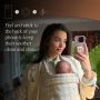 Amy Jackson with baby, holding phone with StayPut™ Pocket attached.