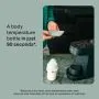 Image of Perfect Prep machine and Natural Start bottle on a kitchen counter with parent in the background using the Tommee Tippee app on their phone with text overlay of USP