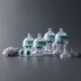 Newborn starter set against a grey background