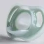 Close up of pacifier on a grey background