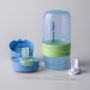 Blue on-the-go straw cup components laid out against a grey background
